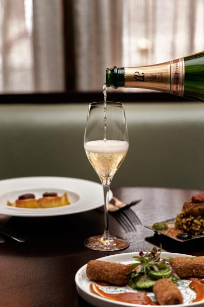 Valentine’s romantic candle lit dining menu at Jamavar Restaurant Berkeley Square Mayfair celebrations, candlelight flickers across the dining room.