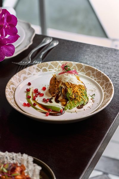 Valentine’s romantic candle lit dining menu at Jamavar Restaurant Berkeley Square Mayfair celebrations, candlelight flickers across the dining room.